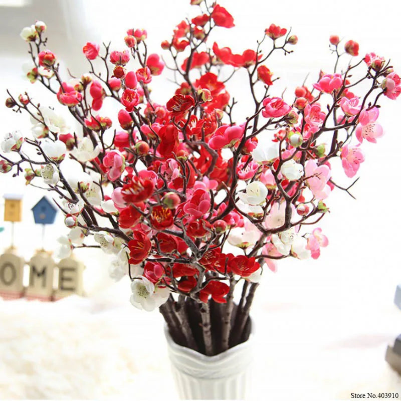 Artificial silk cherry blossom branches featuring red and pink flowers on dark branches for home and wedding decor
