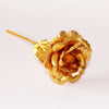 A single artificial rose made of 24k gold foil attached to a thin golden wire.