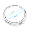 A clear, circular mini double-sided folding makeup mirror with measurements marked 5cm and 6cm.