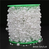 A spool of white ivory pearl beads used for garland decoration, packaged with a 8mm 5m lot.