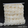 Ivory pearl bead garland featuring small spherical beads packaged for wedding and event decoration