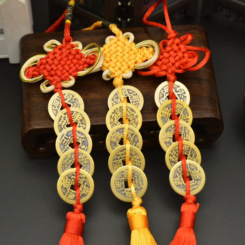 Handwoven knot charm featuring copper coins in various colors and textures for Feng Shui