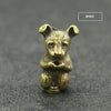 A small brass statue of a fox with upright ears, designed as an incense holder.