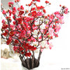 Artificial silk cherry blossom branches featuring pink and red flowers on dark branches