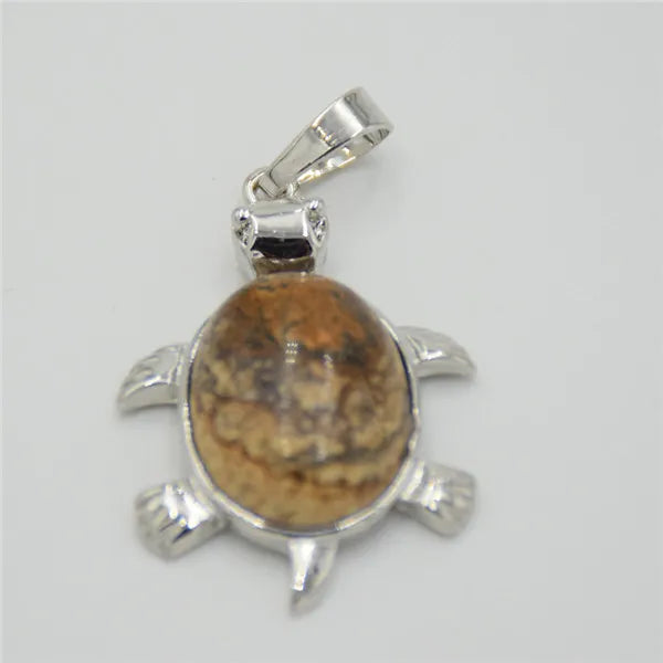 Silver pendant necklace featuring a polished, oval natural stone with brown and tan mottled patterns.