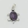 Silver pendant necklace featuring a polished purple amethyst stone shaped like an animal.