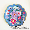 A blue floral plate with pink and white flowers and green leaves, part of an 8-piece disposable tableware set.
