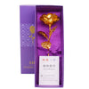 A gold foil artificial rose bouquet is displayed inside a purple box with a label for a test report.