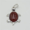 Silver pendant necklace featuring a polished reddish-brown natural stone shaped like an animal.