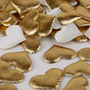 Gold and white heart-shaped sponge confetti for weddings and celebrations