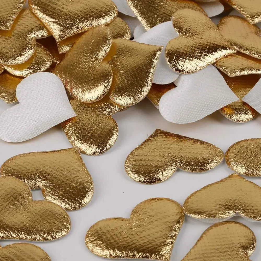 Gold and white heart-shaped sponge confetti for weddings and celebrations