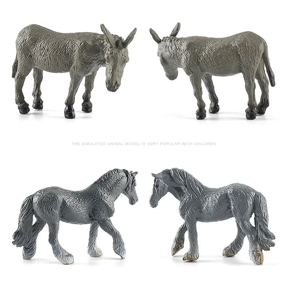 A set of realistic gray farm animal figurines, including a donkey, a horse, and a wolf.