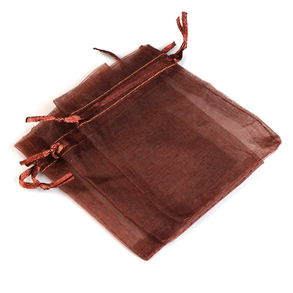 A dark brown organza drawstring gift pouch with a gold-colored cord closure.