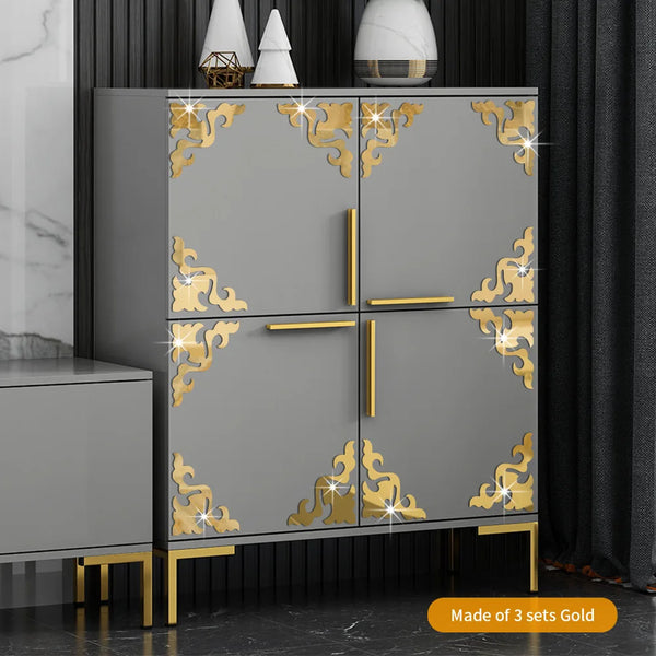 A gray cabinet with gold leaf accents and black vertical slats, featuring decorative self-adhesive tiles.
