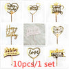 A set of ten gold acrylic love happy birthday cake toppers featuring various designs and text