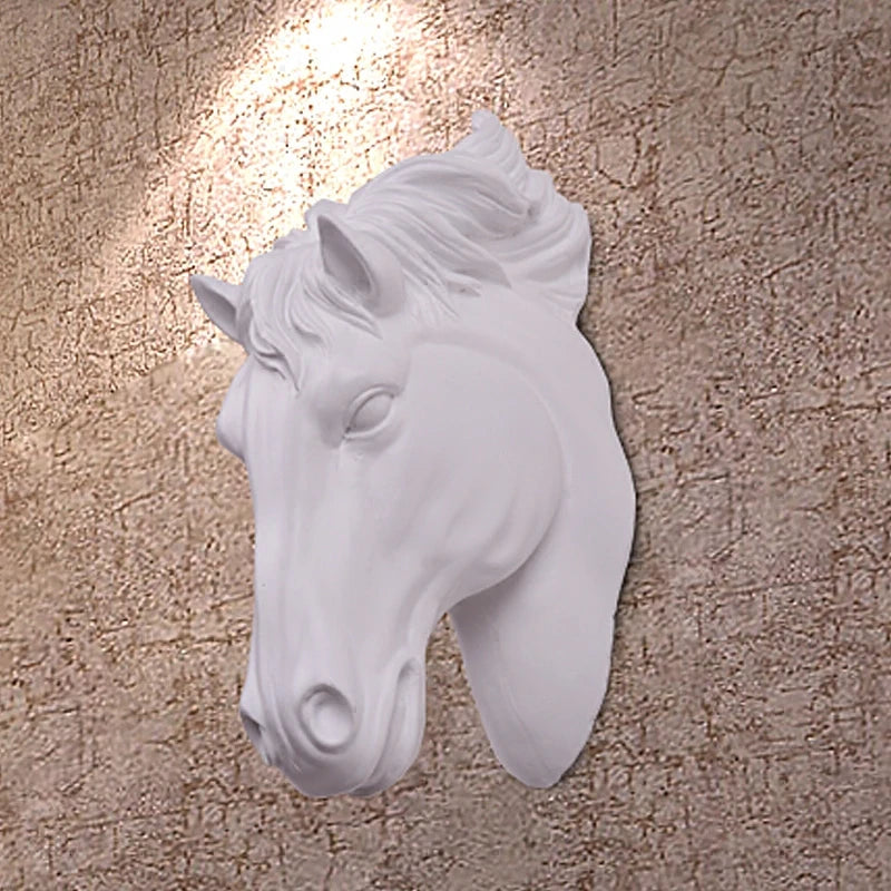 White 3D resin horse head wall sculpture mounted on a textured beige wall.