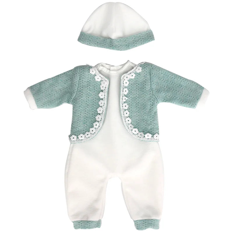 A white doll outfit set including a matching hat and light mint green fabric with white floral trim.