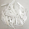 A collection of clear, translucent natural selenite crystal wands for healing and crafting.