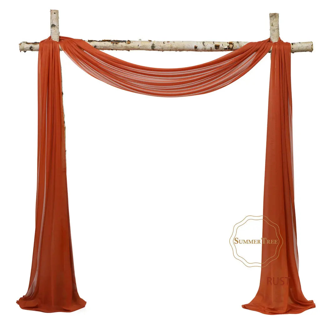 Orange sheer chiffon fabric drape used as a backdrop for weddings and events