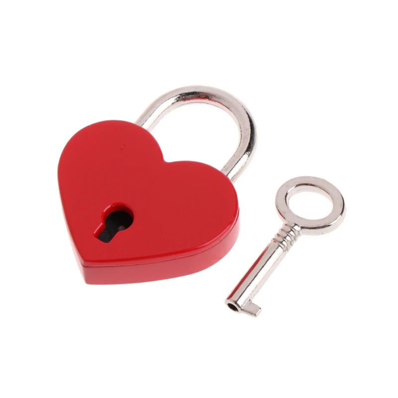 A vintage red heart-shaped mini padlock and its corresponding key.