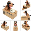 A set of automated robotic dog piggy banks in various sizes and colors, featuring a dog figure and a coin slot.