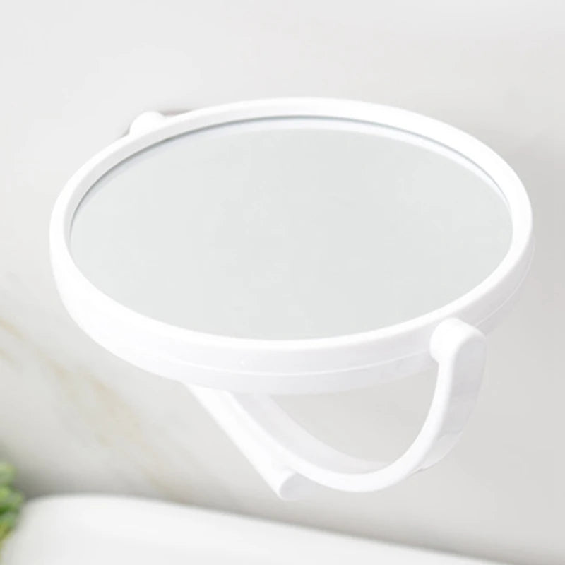 White 360° rotating wall-mounted vanity mirror with HD magnification attached to a wall.