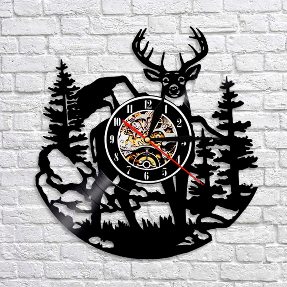 Black silhouette wall clock featuring a woodland elk deer head design and a clock face with a red hand.