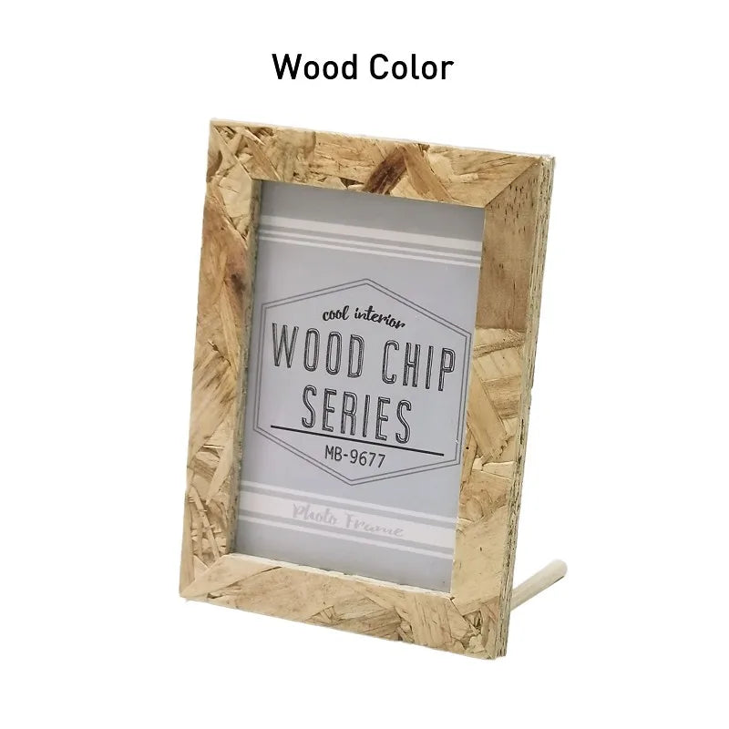 A natural wood rectangular photo frame with a glass insert displaying the text Wood Chip Series MB-9677