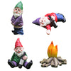 Three miniature resin gnome statues in various poses and colors for garden decor