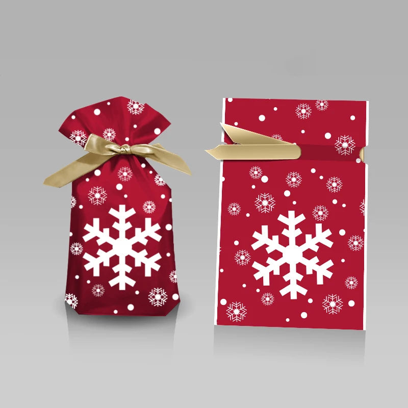 Red festive drawstring gift bags decorated with white snowflakes and Santa designs