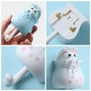 A set of cute cartoon cat wall hooks in light blue and white for organization