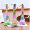 Three glass test tubes filled with colorful pastel foam beads for crafting and decoration
