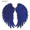 A pair of royal blue sequin wing patches for DIY sew-on or iron-on embellishment.