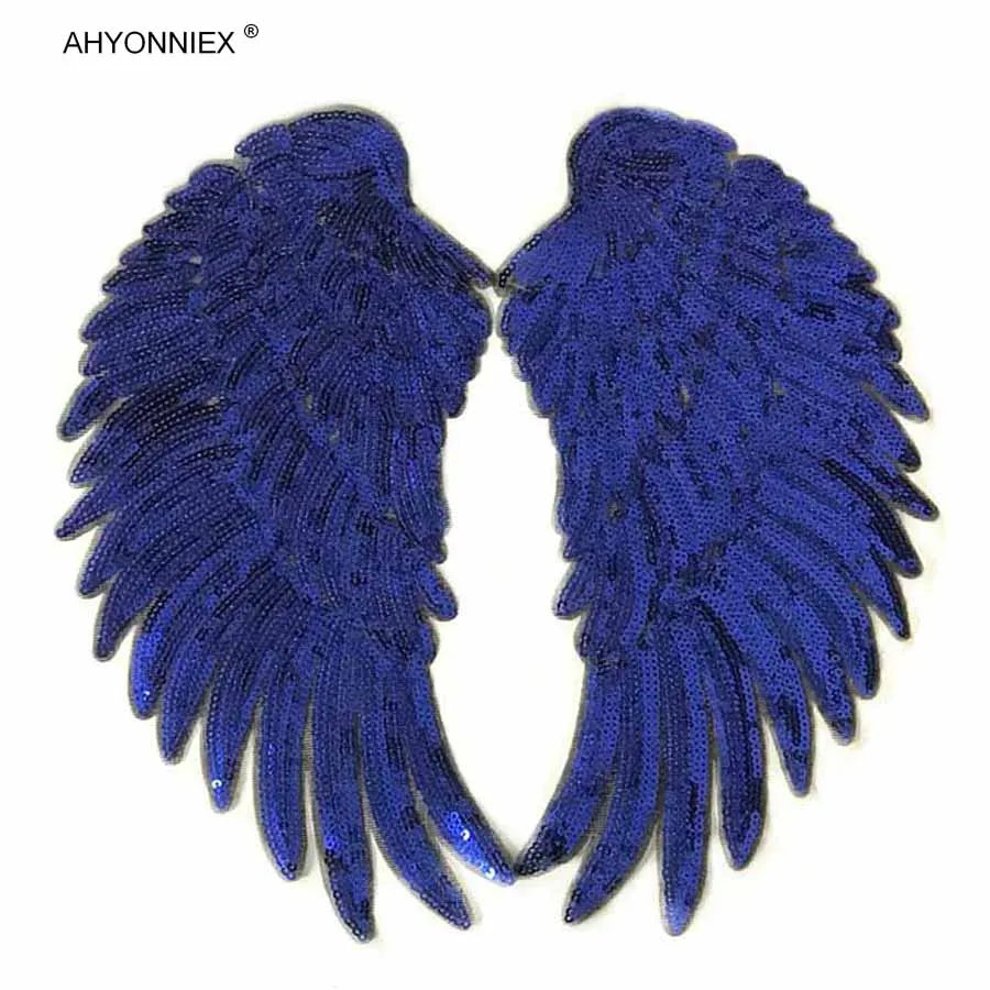 A pair of royal blue sequin wing patches for DIY sew-on or iron-on embellishment.