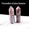 A translucent pink tourmaline crystal point prism tower for meditation and home decor.