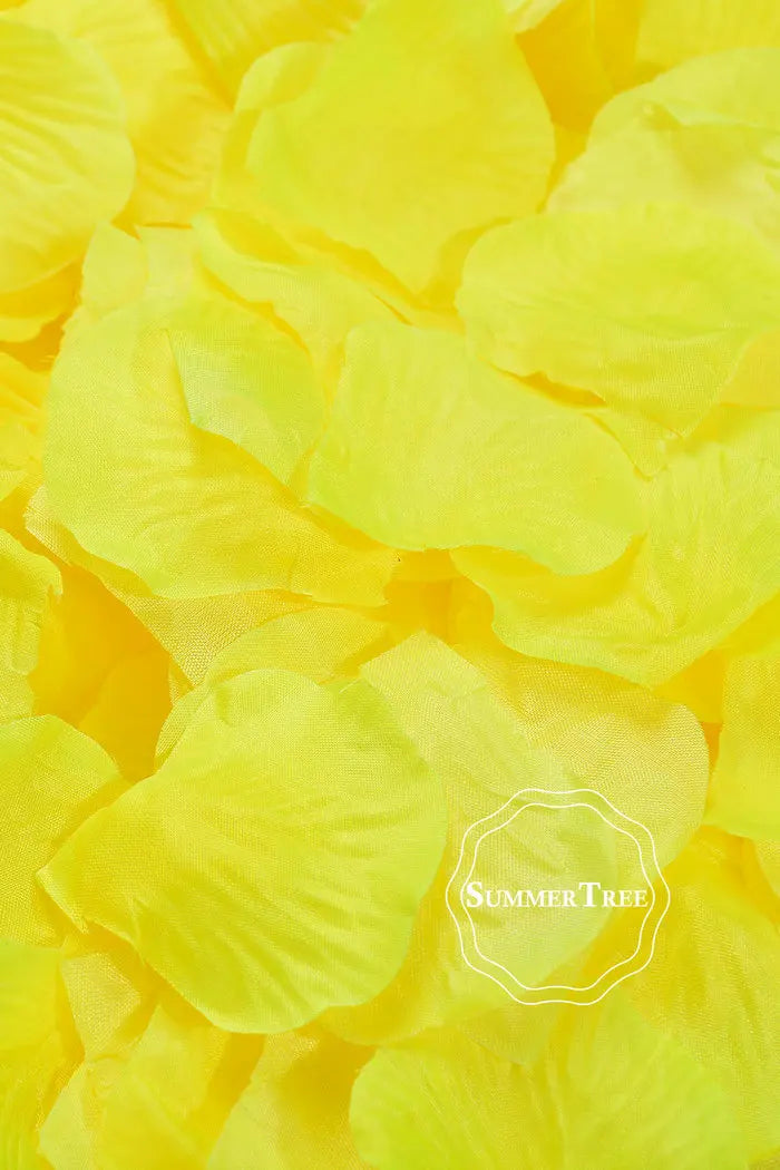 A close-up of bright yellow silk rose petals used for weddings and events.