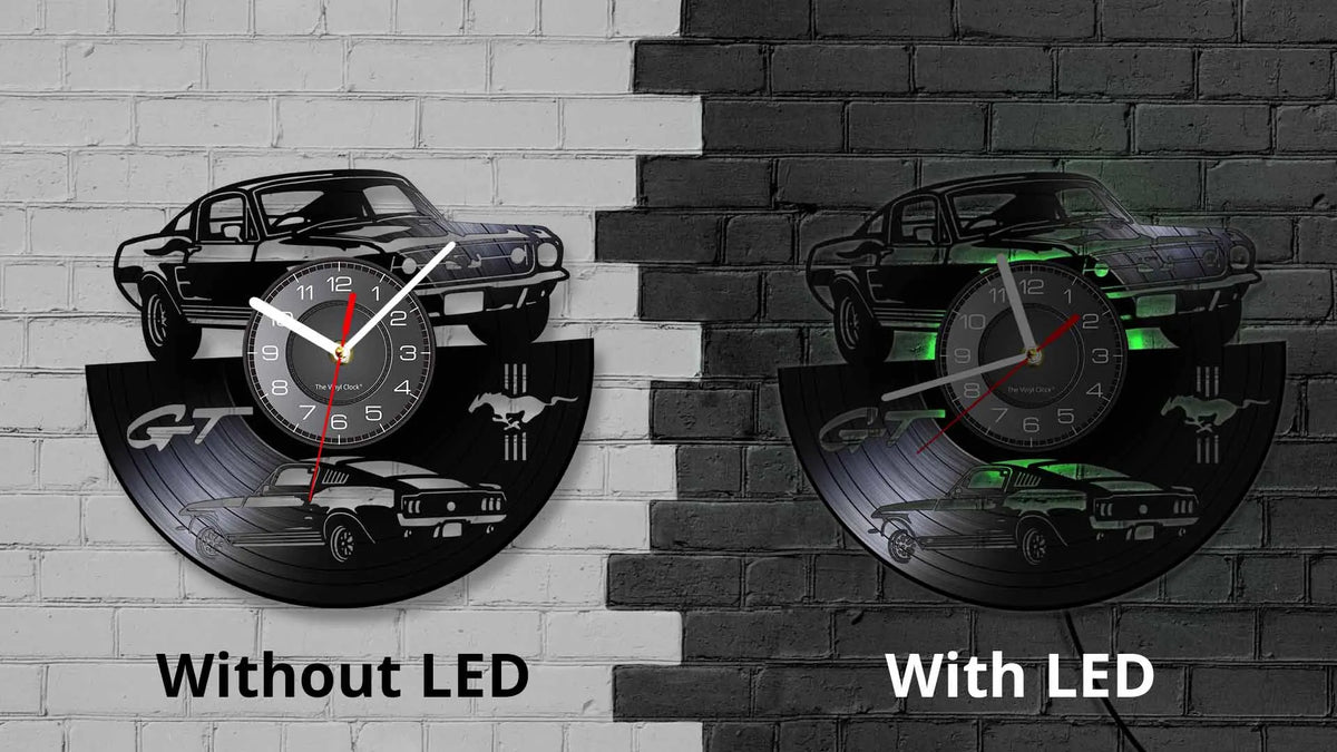 A wall clock featuring a sports car design, shown in two versions: without LED and with LED.