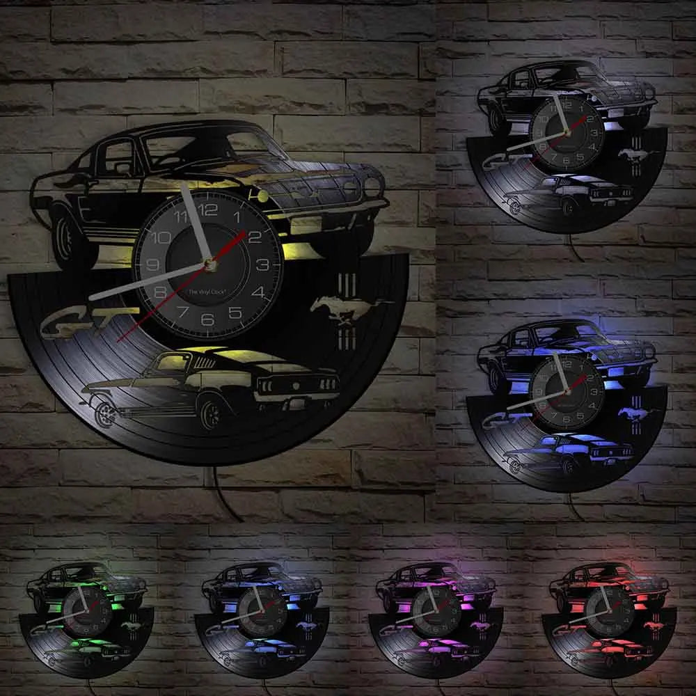 A collection of vinyl record sports car wall clocks featuring various cars and racing themes on a brick background.