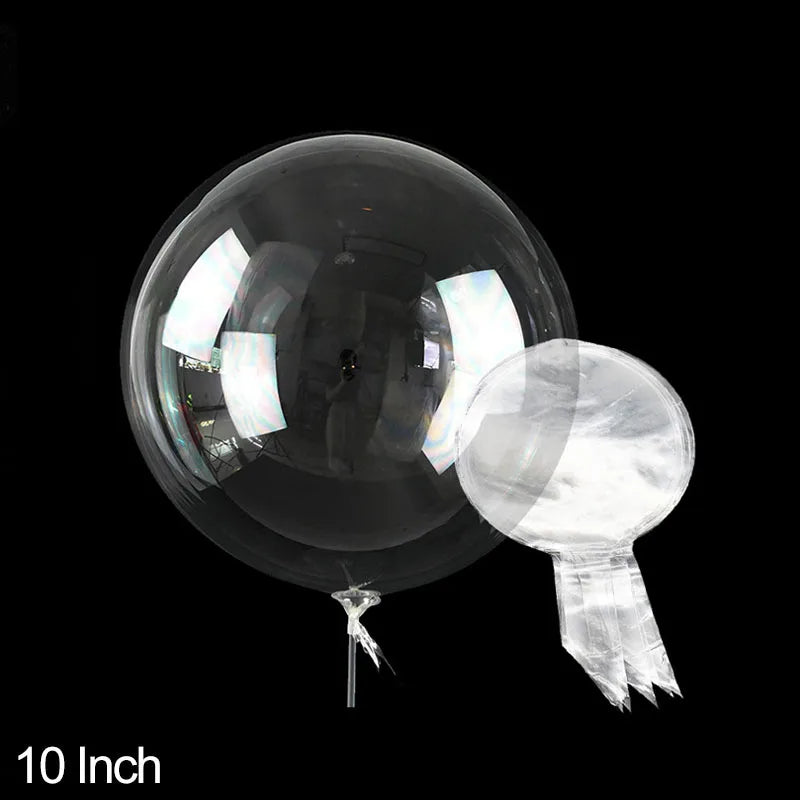 A clear PVC party balloon is shown against a black background.