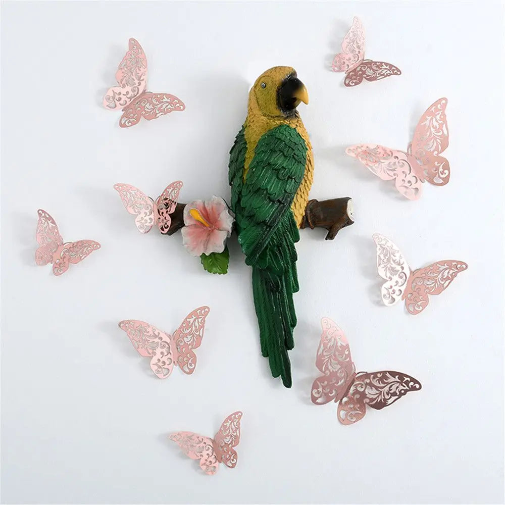 Ein Set aus 3D-Hohl-Schmetterlings-Wandaufklebern mit einem gelben Vogel und verschiedenen rosa und grünen Schmetterlingen.