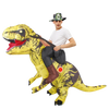 A man wearing a T-Rex inflatable costume and a camouflage hat is posing with the yellow dinosaur figure.