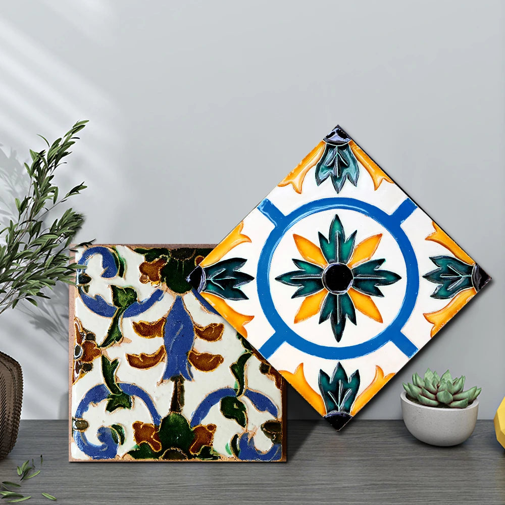 A square tile sticker featuring a blue and yellow floral design on a white background