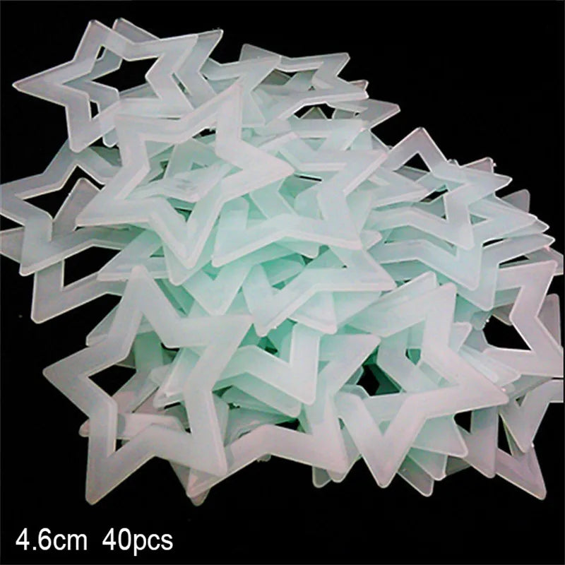 A set of 40 glow-in-the-dark star and moon wall stickers, white in color.