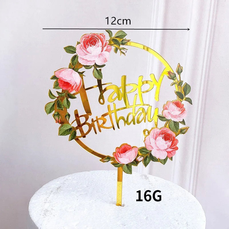 Rose gold acrylic happy birthday cake topper featuring pink roses and gold lettering