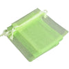 A stack of light green organza drawstring gift pouches for jewelry, candy, or party favors.