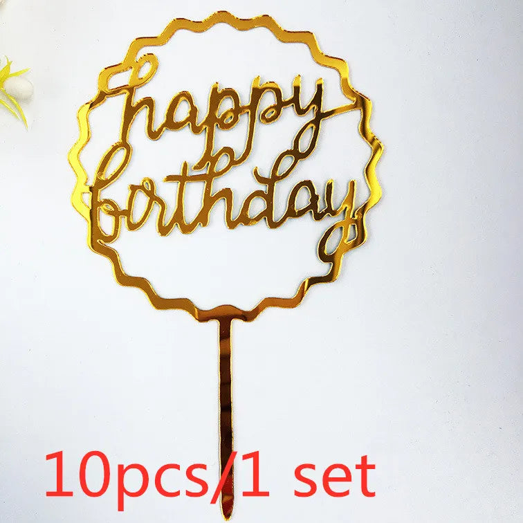 A set of ten gold acrylic love happy birthday cake toppers shaped like a wreath on a stick.