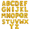 A set of gold foil letter balloons spelling out the entire English alphabet.