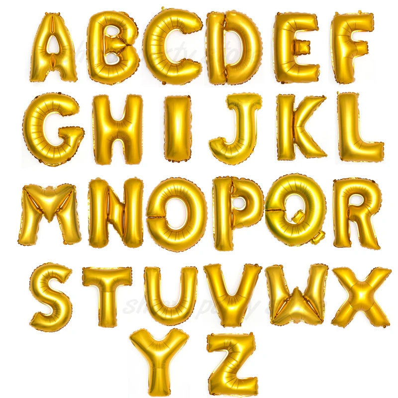 A set of gold foil letter balloons spelling out the entire English alphabet.