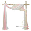 Elegant chiffon fabric drape in white, ivory, and light pink colors used for a wedding arch backdrop.