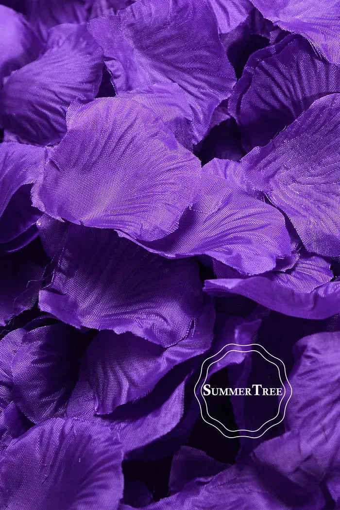 A close-up of vibrant purple silk rose petals used for weddings and events.